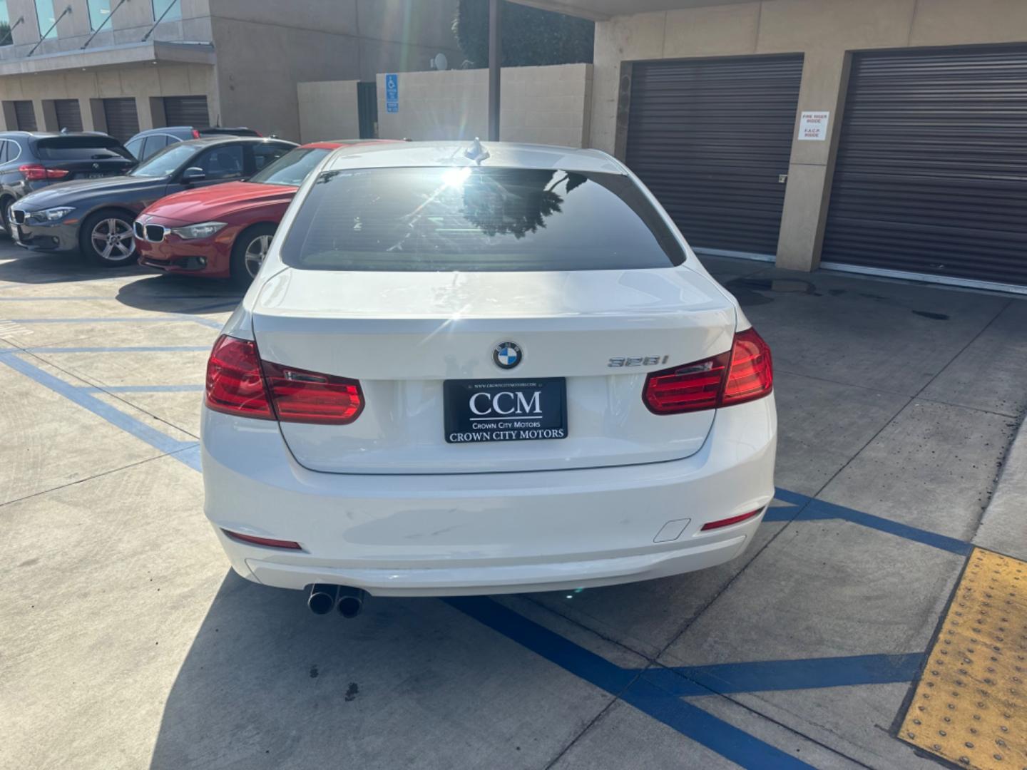 2012 WHITE /Tan BMW 3-Series Leather (WBA3C1C59CF) with an 4 Cylinder engine, Automatic transmission, located at 30 S. Berkeley Avenue, Pasadena, CA, 91107, (626) 248-7567, 34.145447, -118.109398 - Low Miles!! this 2012 BMW 3-Series 328i Sedan looks and drives well. Are you in search of a reliable and stylish vehicle in Pasadena, CA, but concerned about your credit history? Look no further! We have this impressive 2012 BMW 3-Series 328i Sedan with low miles available at our dealership. We unde - Photo#4